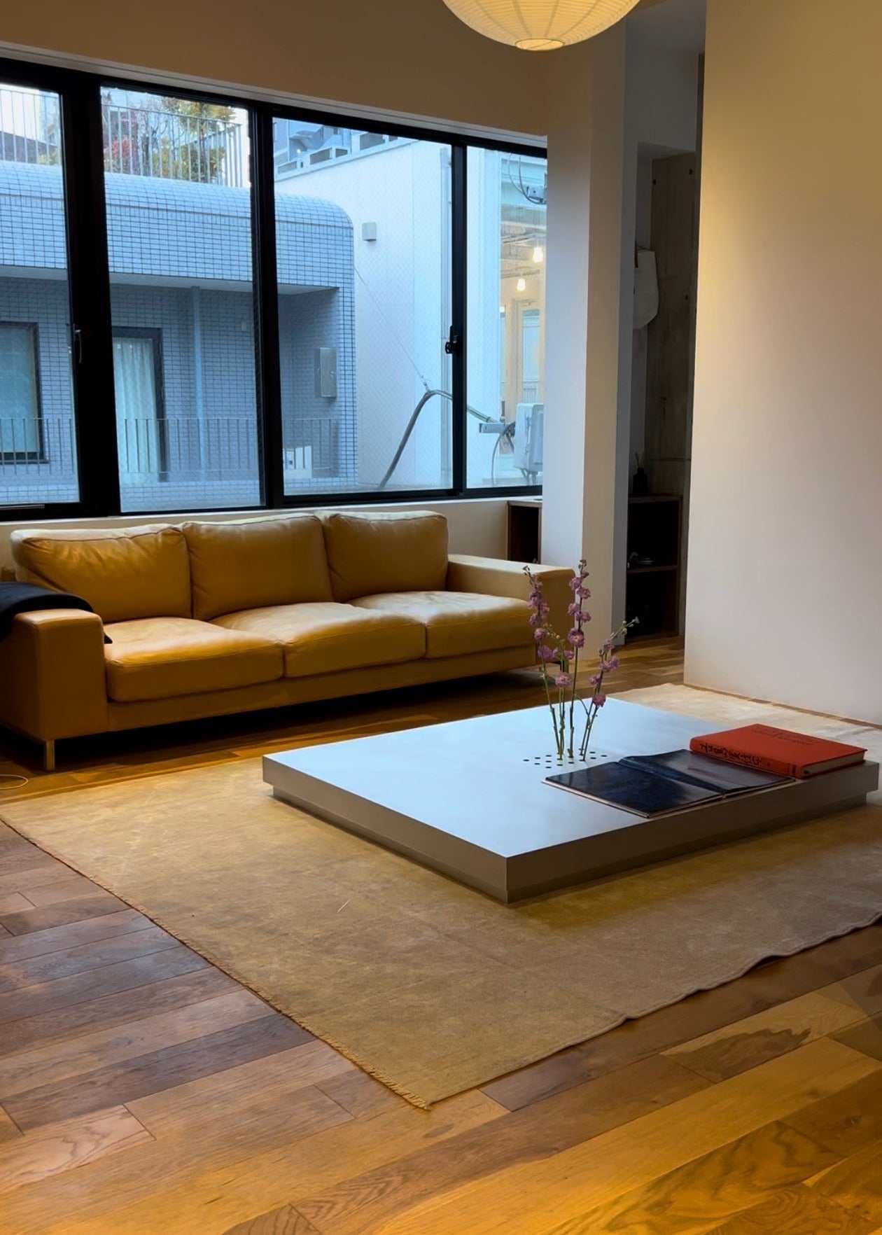 Low metal table. Hole with cover