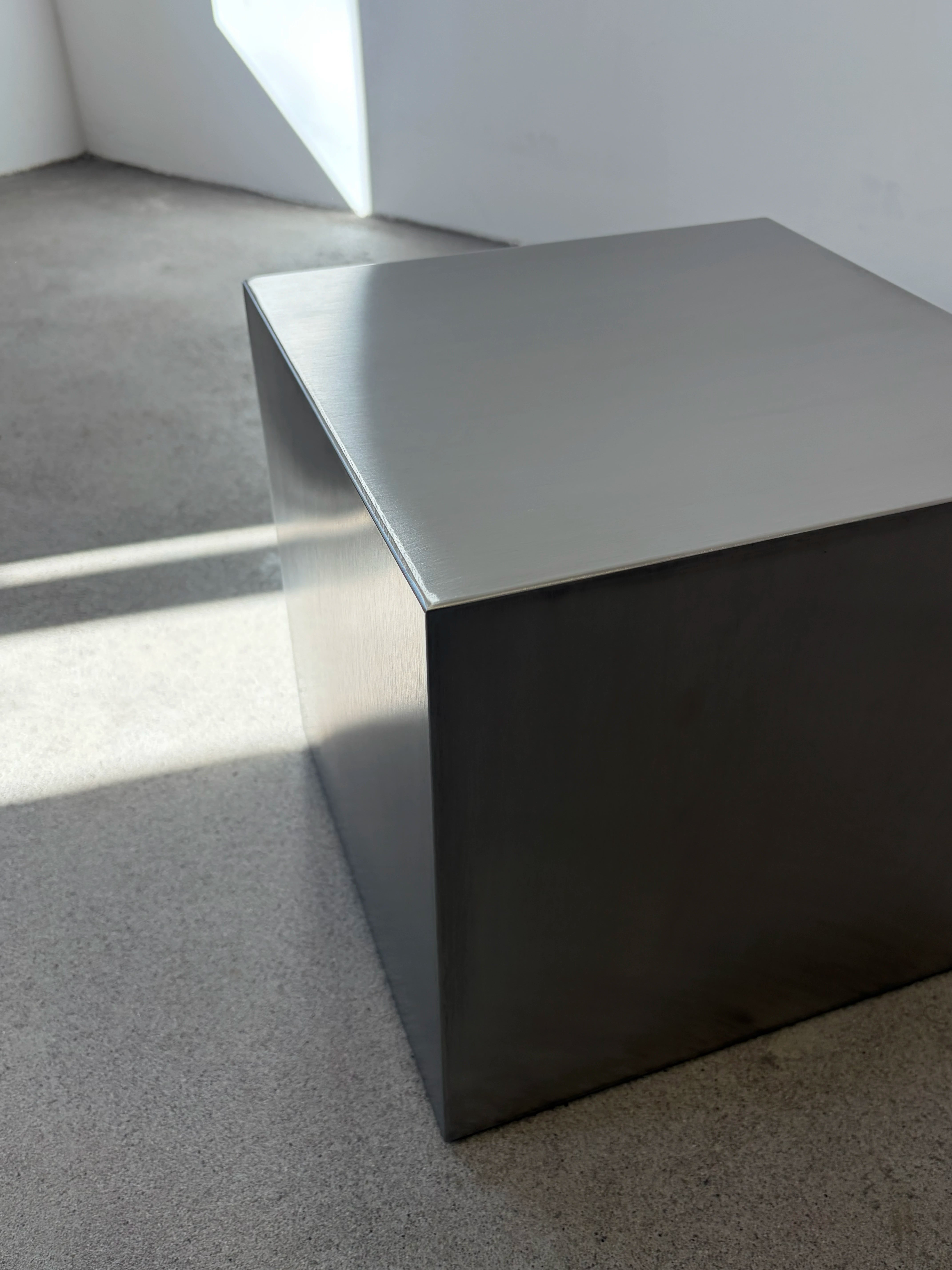 Stainless steel cubic side table