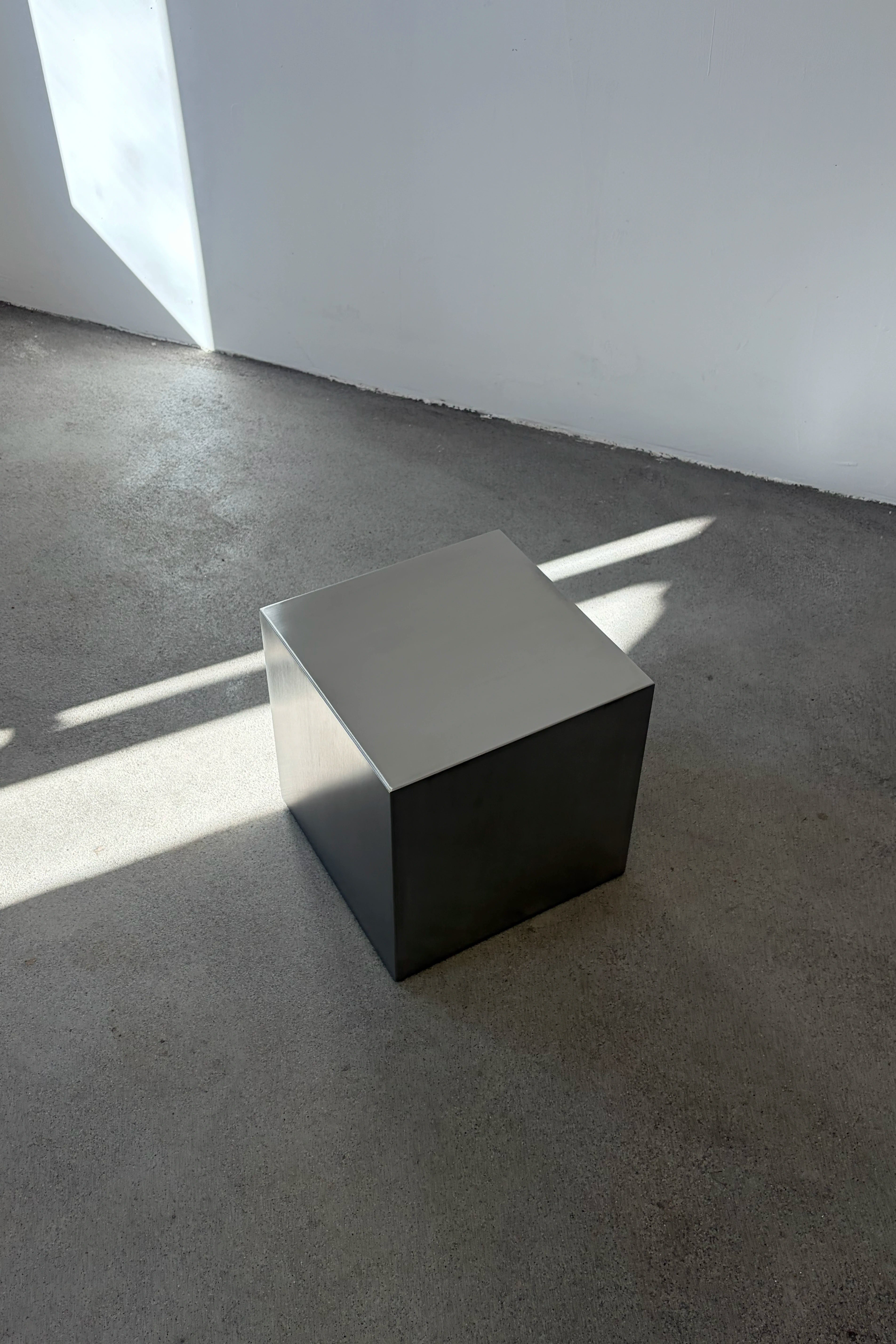 Stainless steel cubic side table