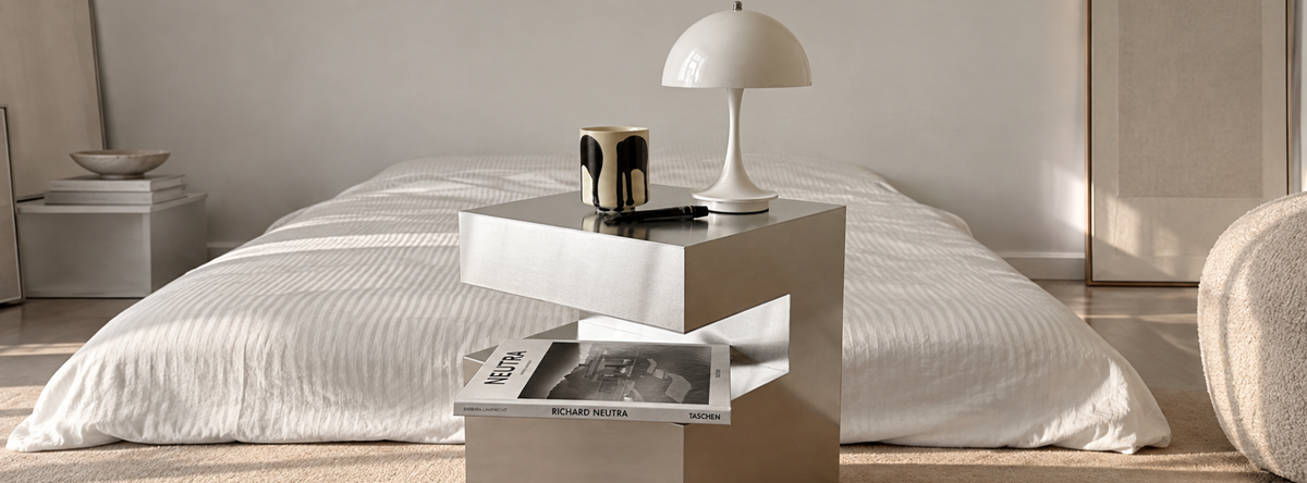 Minimalist aluminum C-frame cube shelf coffee table with a durable metal finish
