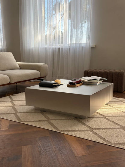 Square metal table with a leg